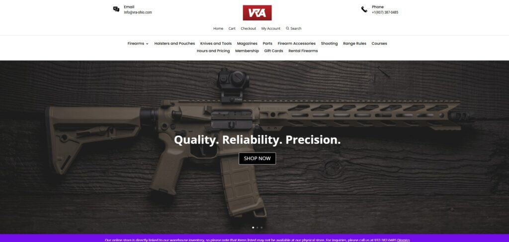 Close-up of tactical rifle with scope on dark wooden background.